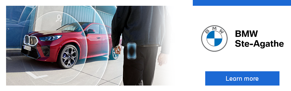 BMW Digital Key Plus automatically detects the driver approaching the red BMW vehicle